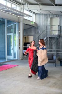 People walking to a red carpet